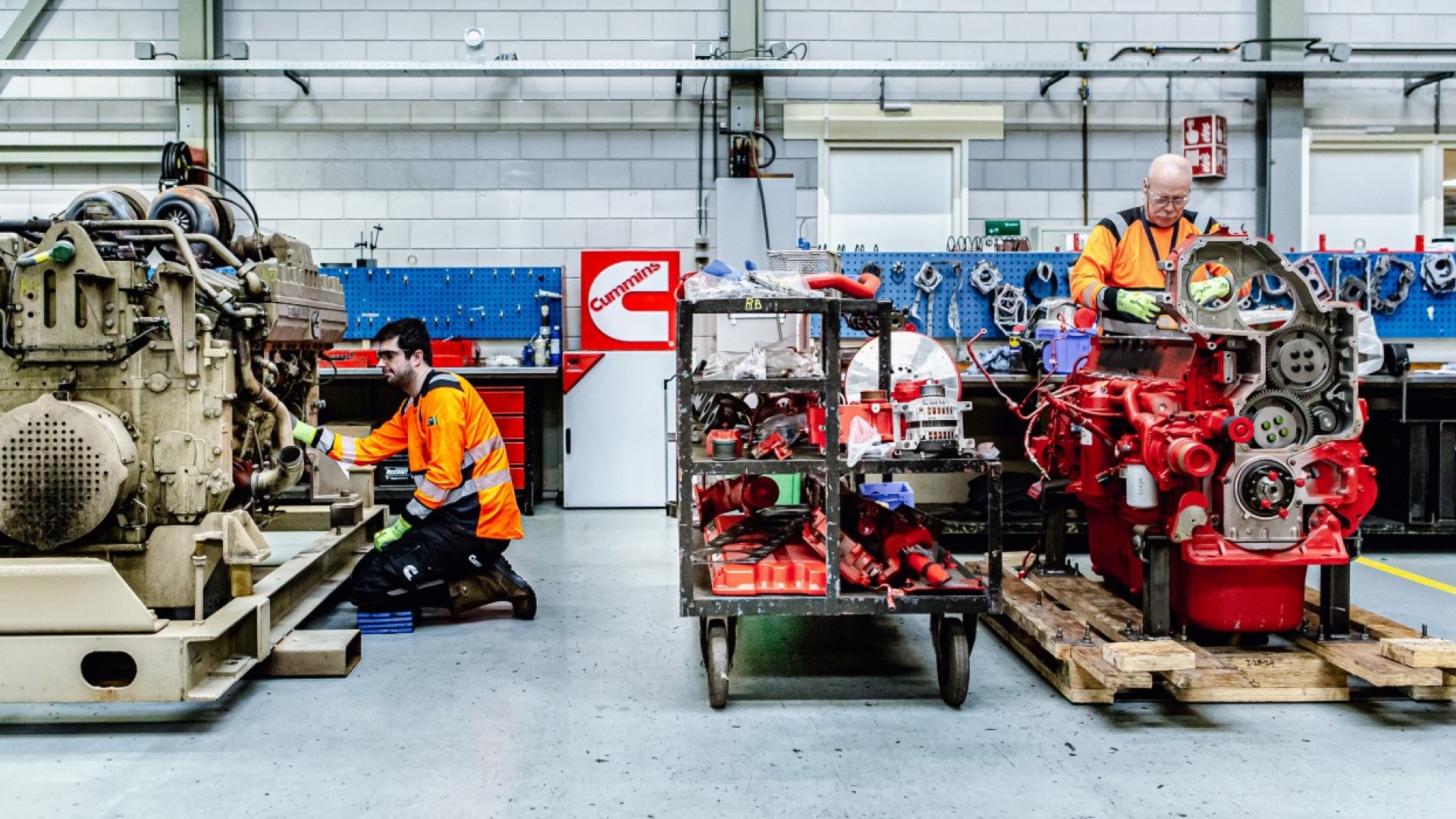 engineers working on engines