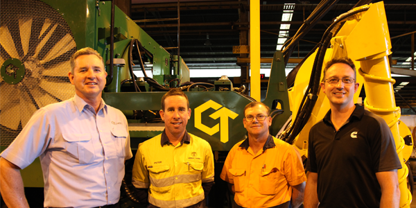 Canetec Clients in front of AX7500 cane harvester
