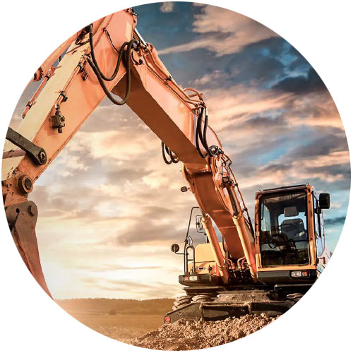 excavator in front of sundown