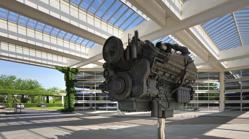 front entrance of cummins office building with engine installation