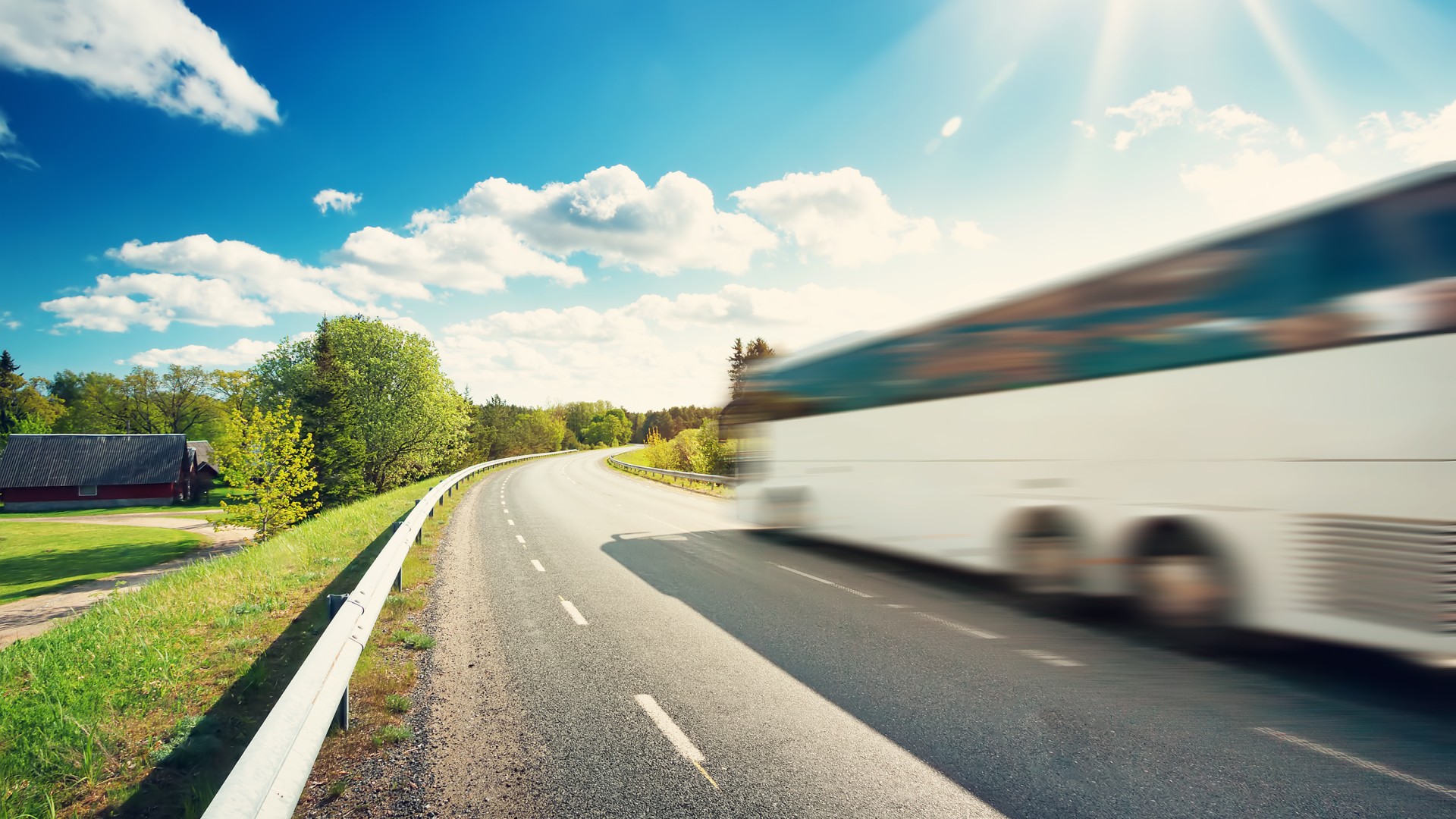 Bus driving on road