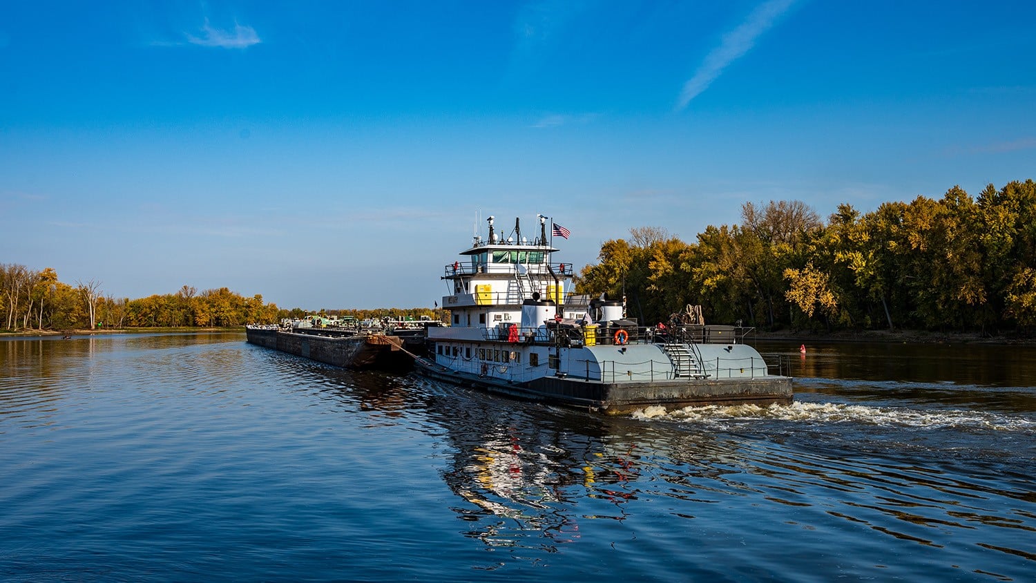 Inland waterway vessel on water