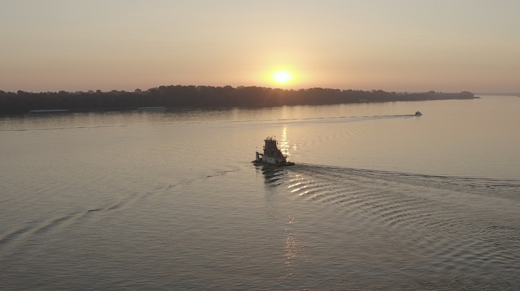 A tug starts its day on the Ohio River.