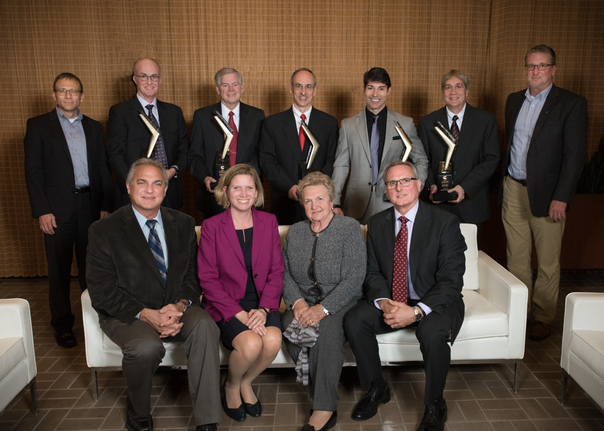Wes Thayer, David Carey, John T. Carroll III, Donald Benson, Michael Tidwell, Richard Reisinger, and Dave Rix are joined by Jennifer Rumsey and members of the Perr family.