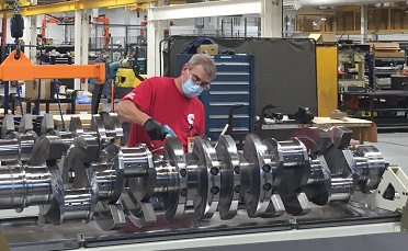 A Seymour Engine Plant employee at work