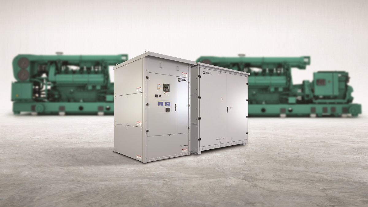 The Cummins ATS-X transfer switch in the foreground, with large powerful generators in the distant background