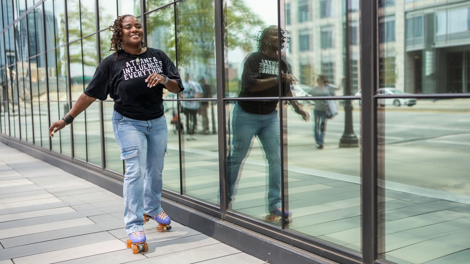 Meko Taylor roller skating in Atlanta, reflecting the joy and purpose behind her Cummins community leadership story.