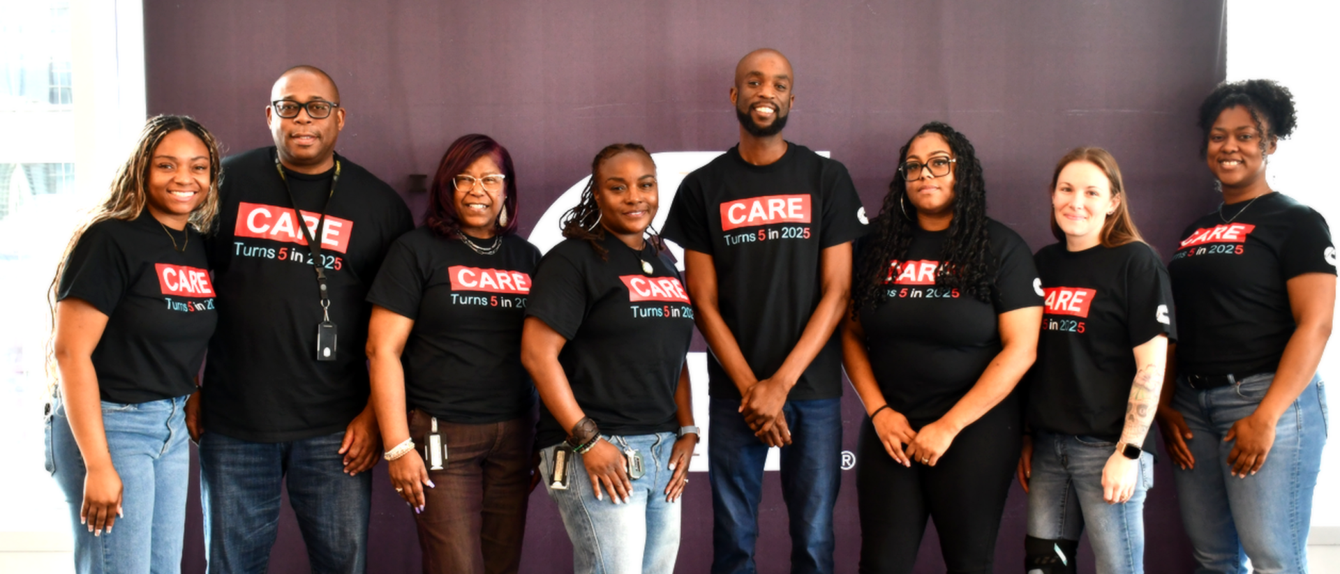 Cummins employees from the Atlanta CARE team pose together for a group photo at a community engagement event.