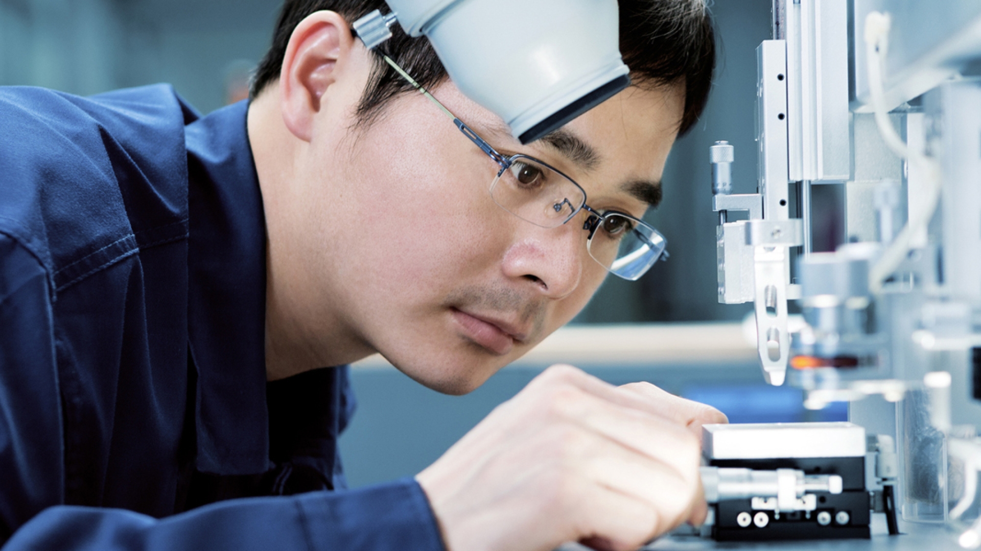 scientist with microscope