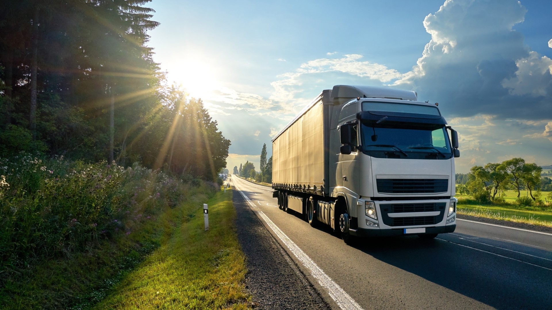 truck driving on road