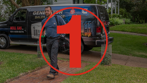 Employee walking from his van to help set up a generator