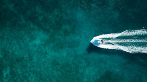 boat riding on ocean