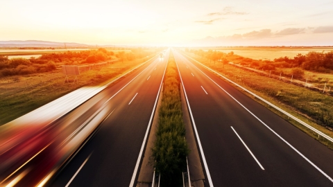 trucks in motion on highway