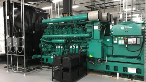 large cummins generator inside warehouse