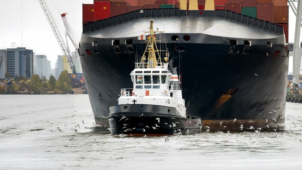 Tug boat on water