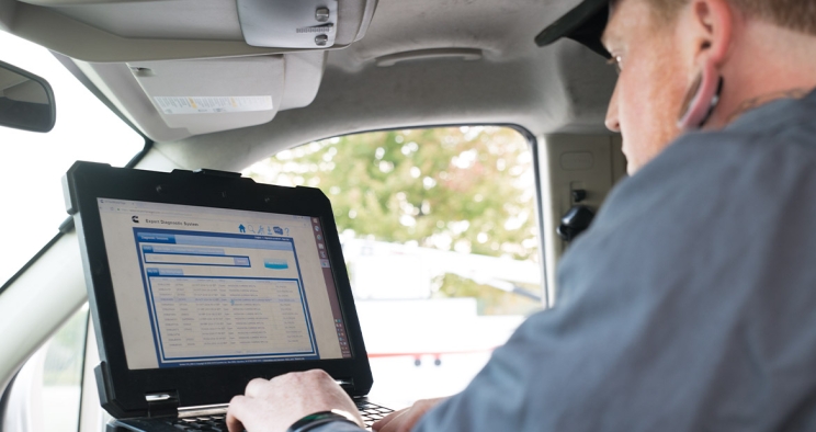 person viewing diagnostic tool on computer