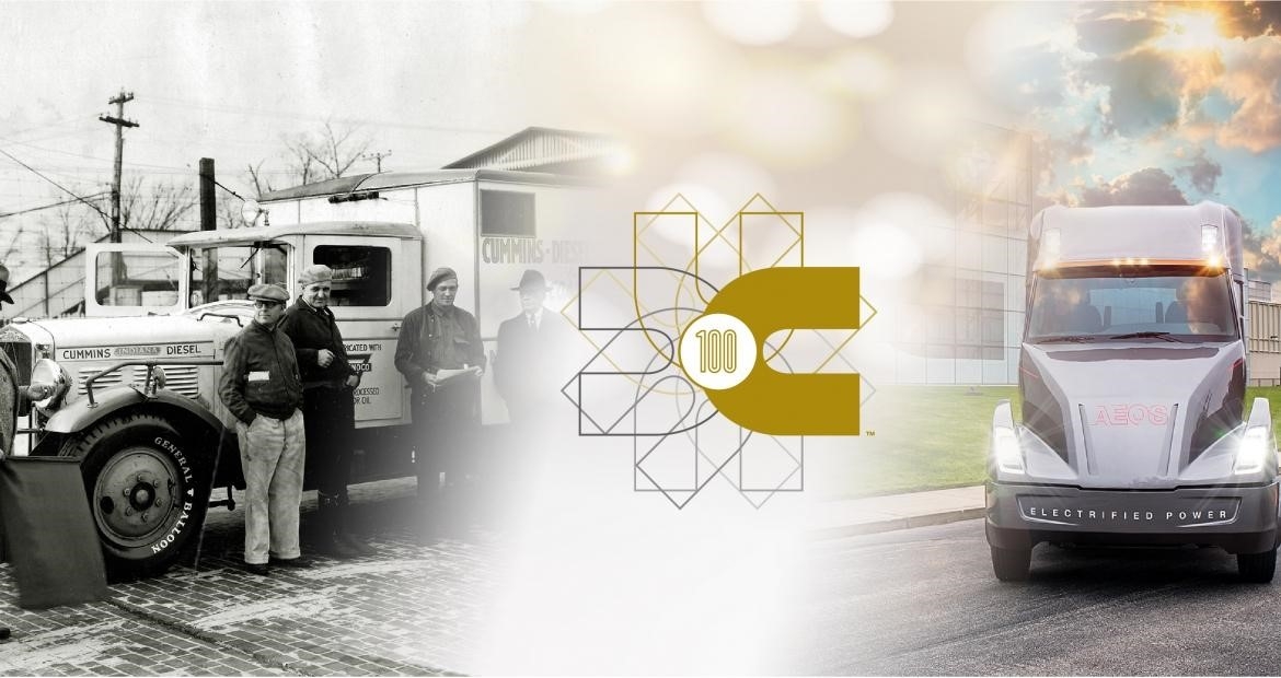 banner displaying cummins' 100th anniversary with images of early truck and modern truck models