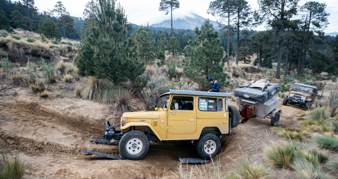 The Clean Cruiser Project’s re-powered Land Cruisers ,with Pico de Orizaba in the background, make a harrowing trip up the mountain. The Clean Cruiser Project’s re-powered Land Cruisers with Pico de Orizaba in the background on what would be a harrowing trip up the mountain.