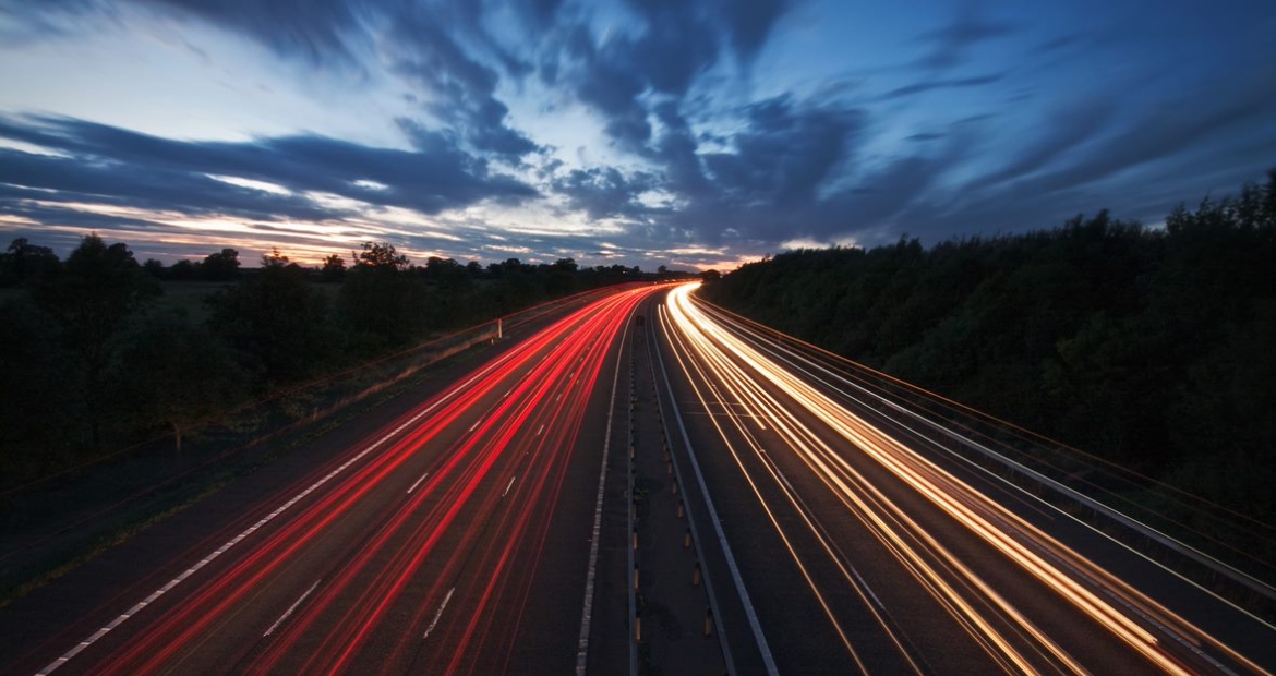 highway after dark with time elapsed vehicle lights