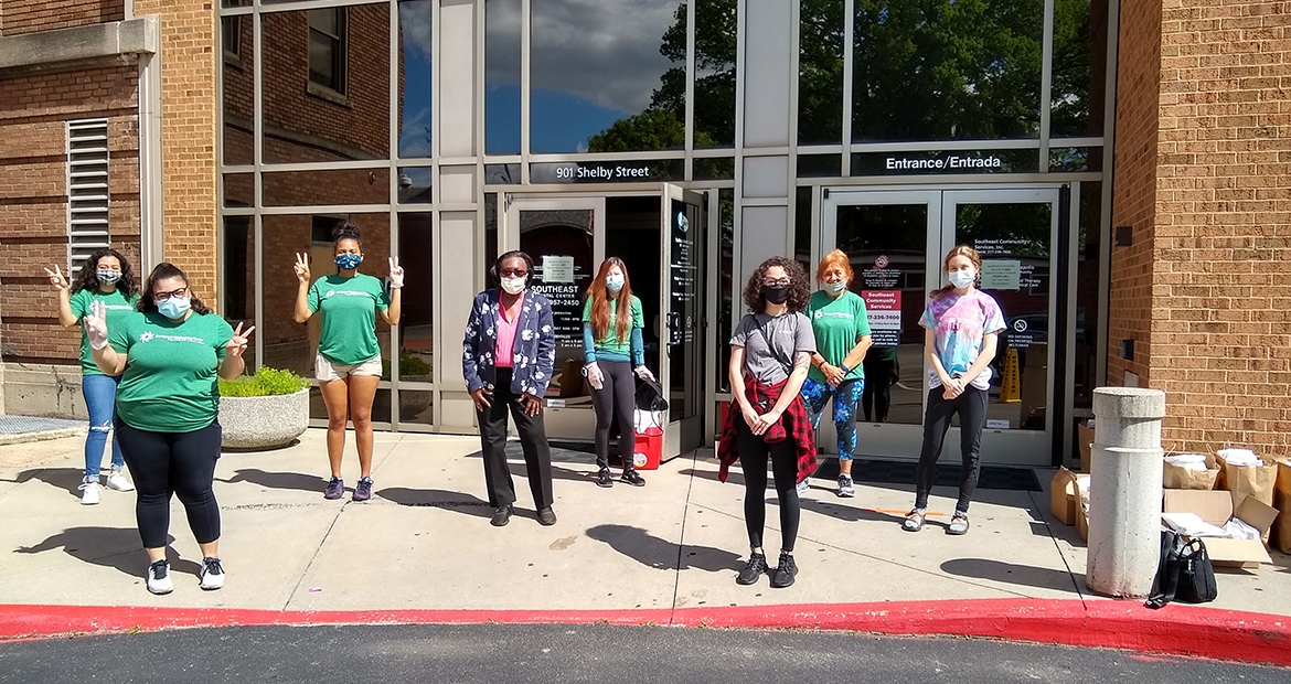 IWC volunteers stand outside its office in Indianapolis, Indiana Immigrant Welcome Center