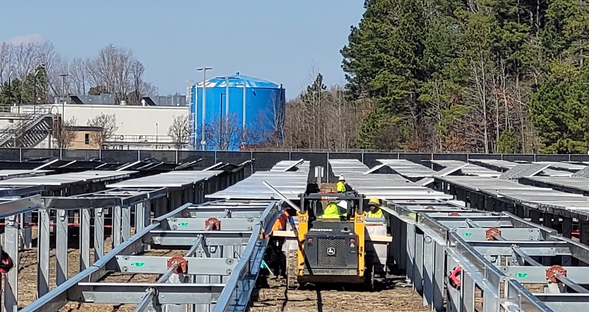 Crews work on the solar array at the Cummins Engine Plant in Rocky Mount, N.C.