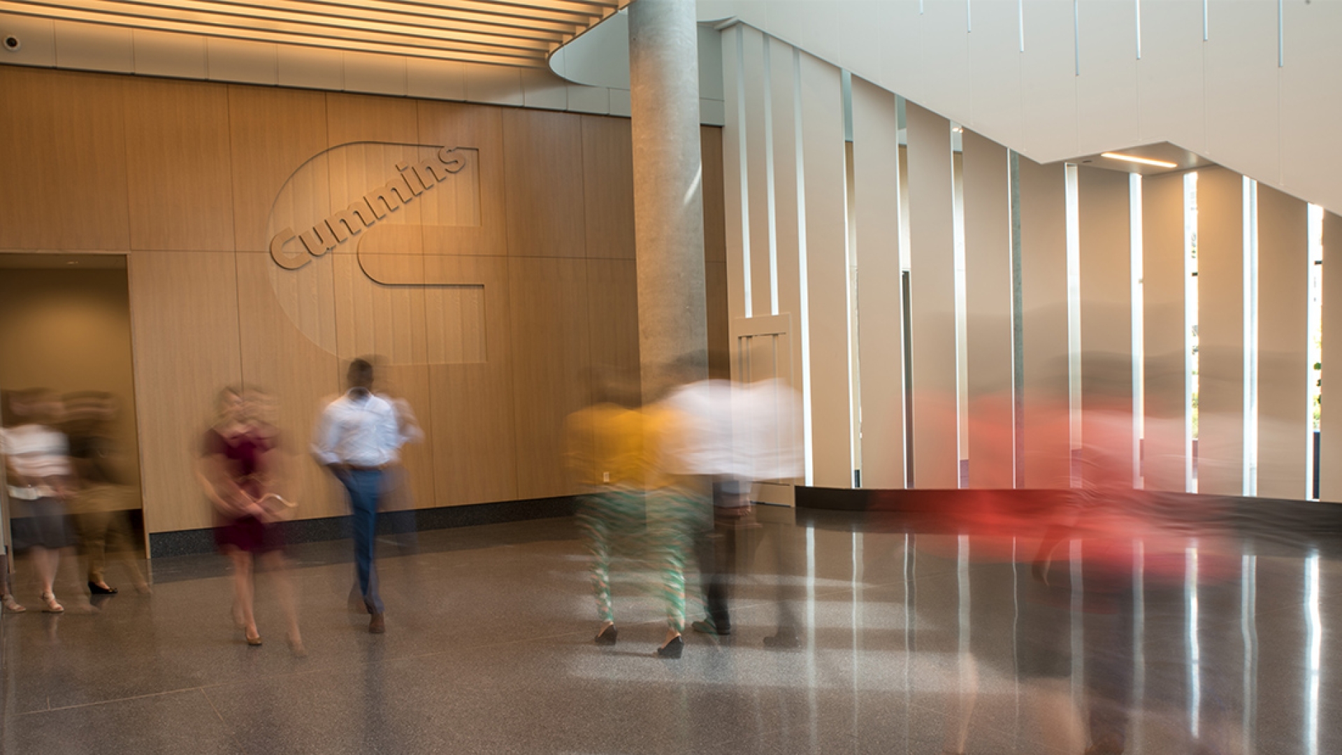employees walking at DBU lobby