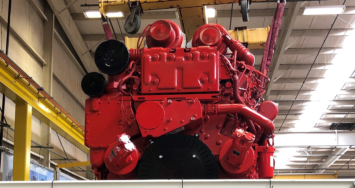 red engine at plant