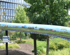 painted art canoe installation outside of Cummins office