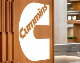 white Cummins logo at entrance of corporate office