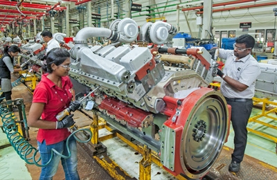 india workers engine assembly line