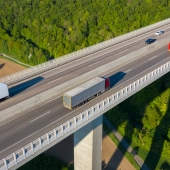 semis driving on a bridge