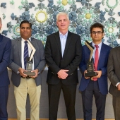 recipients holding trophies