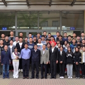 Event attendees in front of the Beijing Polytechnical School