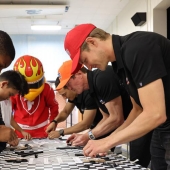 IndyCar drivers building cars with students