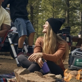 People sitting around a campfire