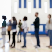 people line up and wait to vote
