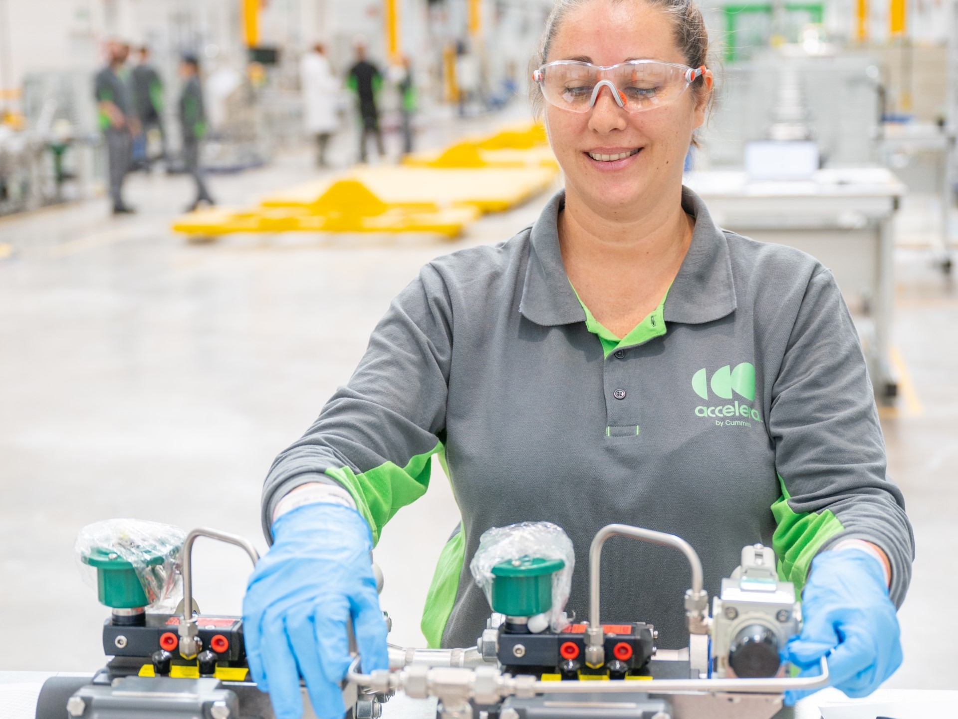 Woman working at Accelera Plant