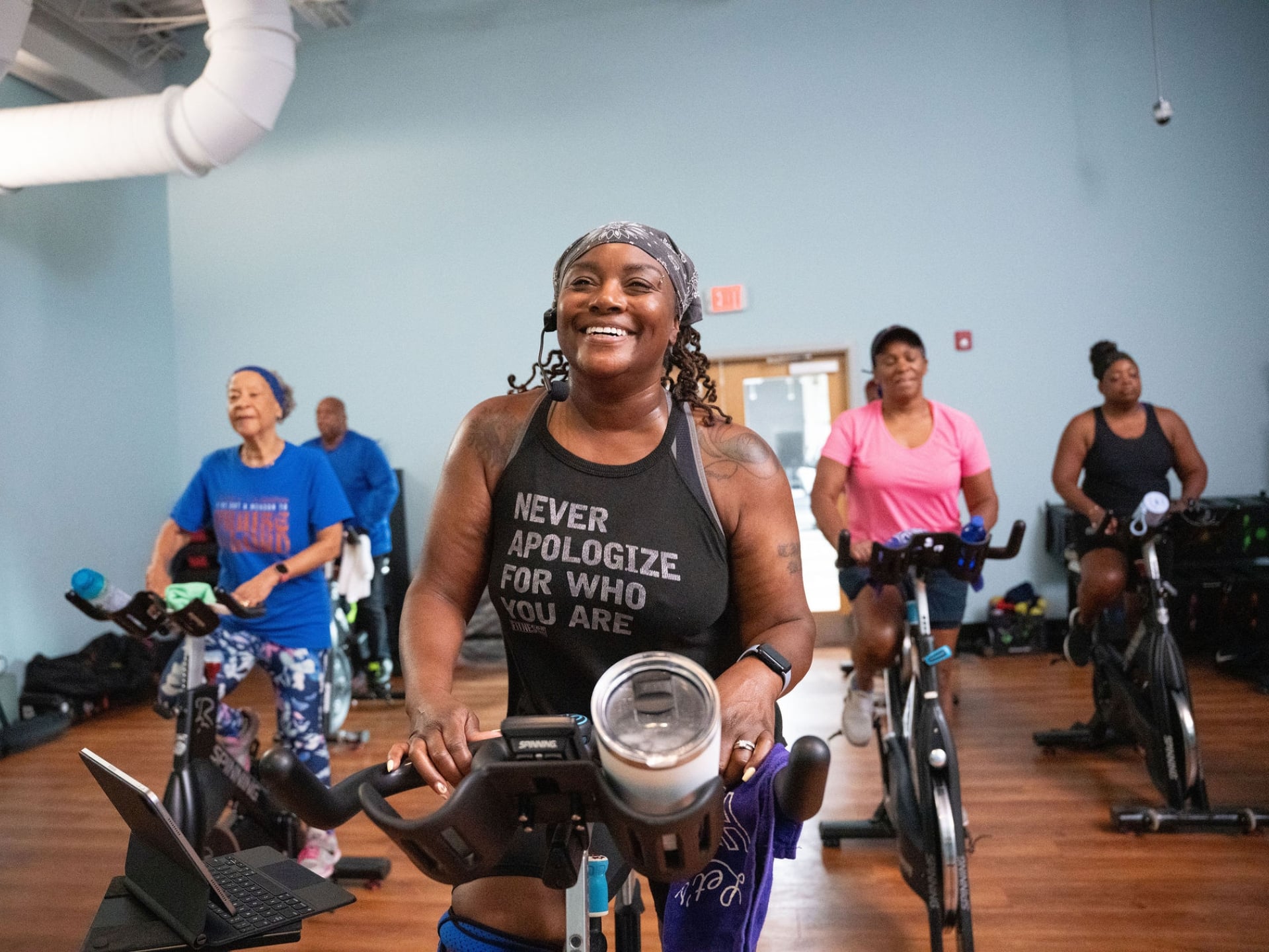 Meko leads a spin class in Atlanta as part of her life outside work.