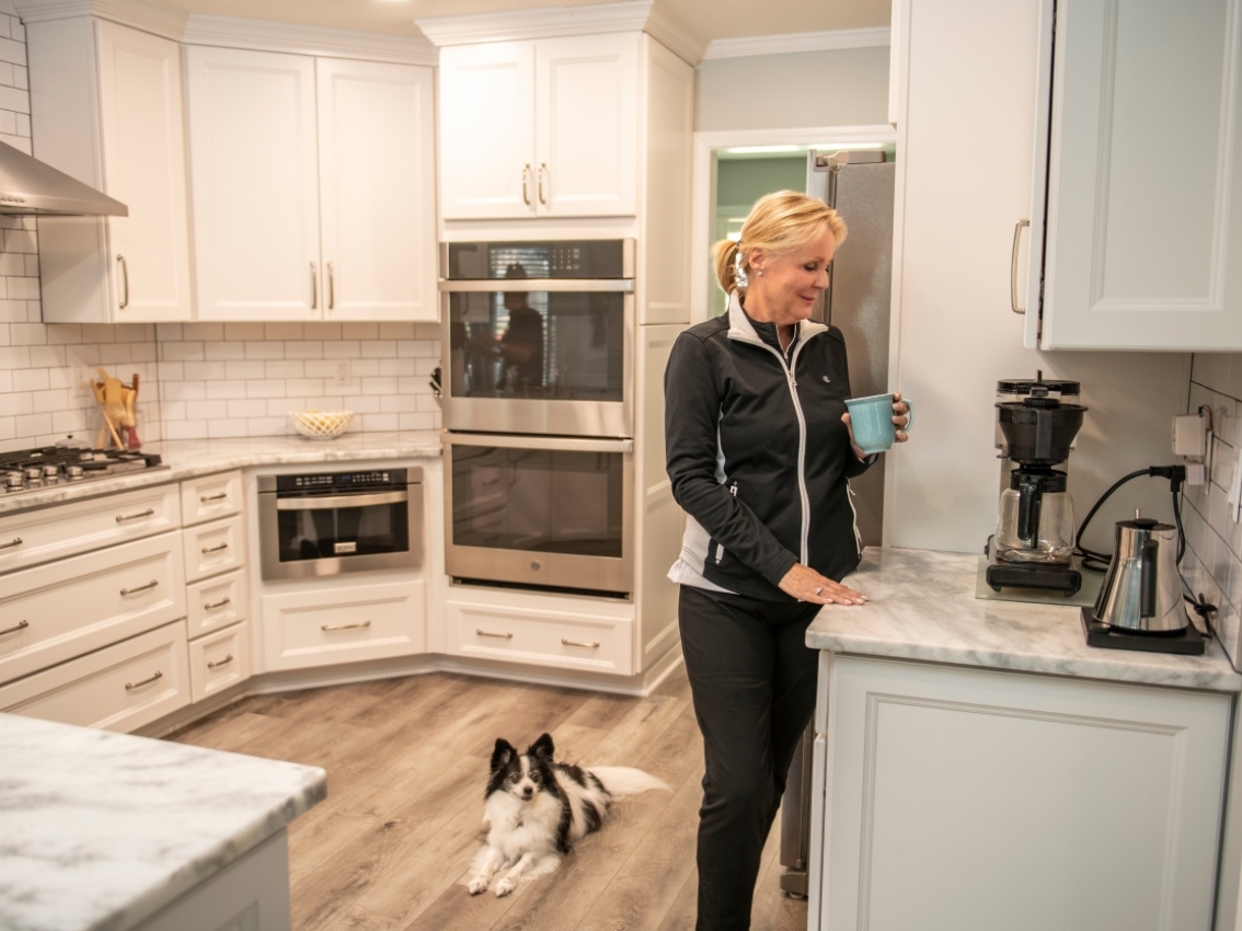 woman enjoying coffee with home power from generator