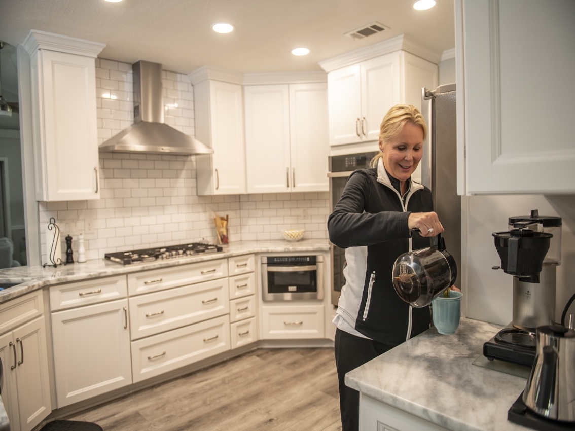 Woman making coffee