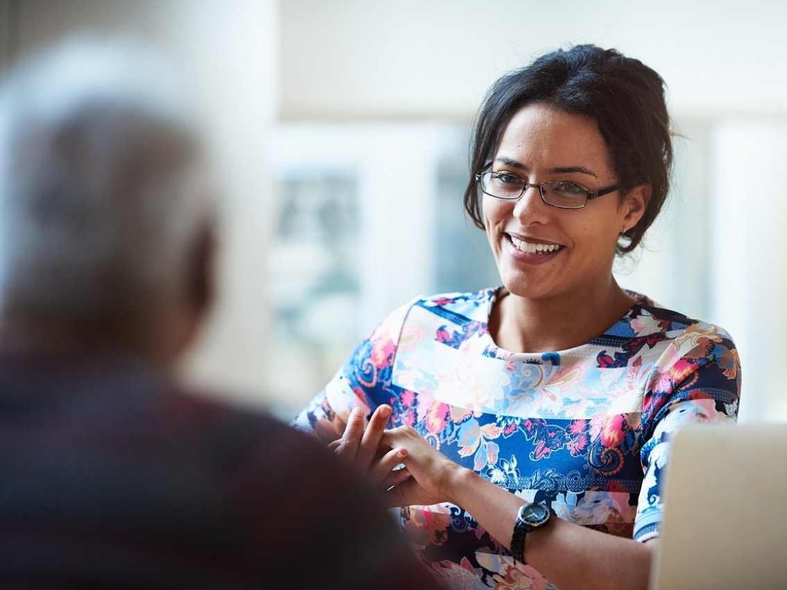 Consultant talking to a patient