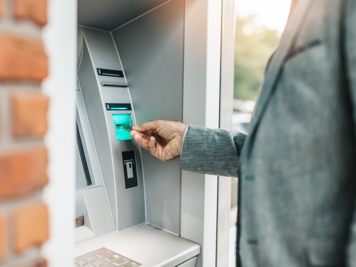 Someone using an ATM